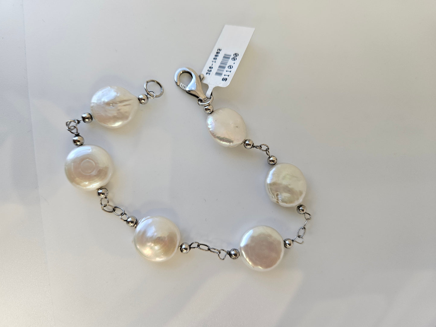 SS White Coin Pearl BRAC (SSI: 66365)