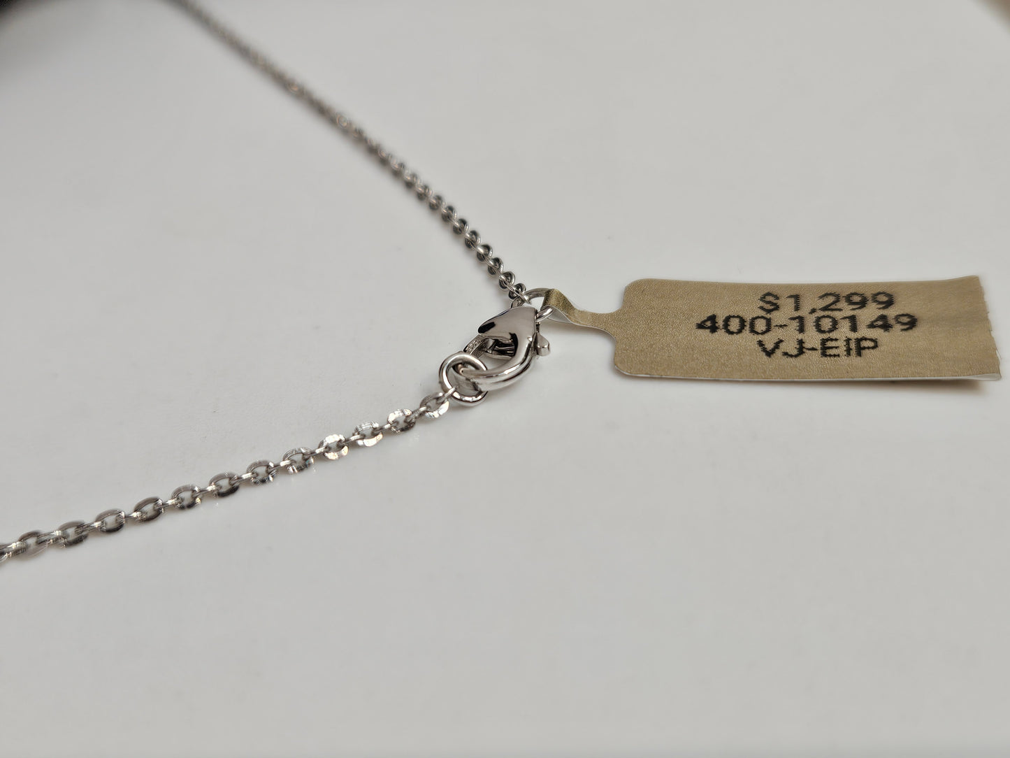 KITE CROSS 1CTTW DIA E/VVS2 18" 14KTWG 3.30g