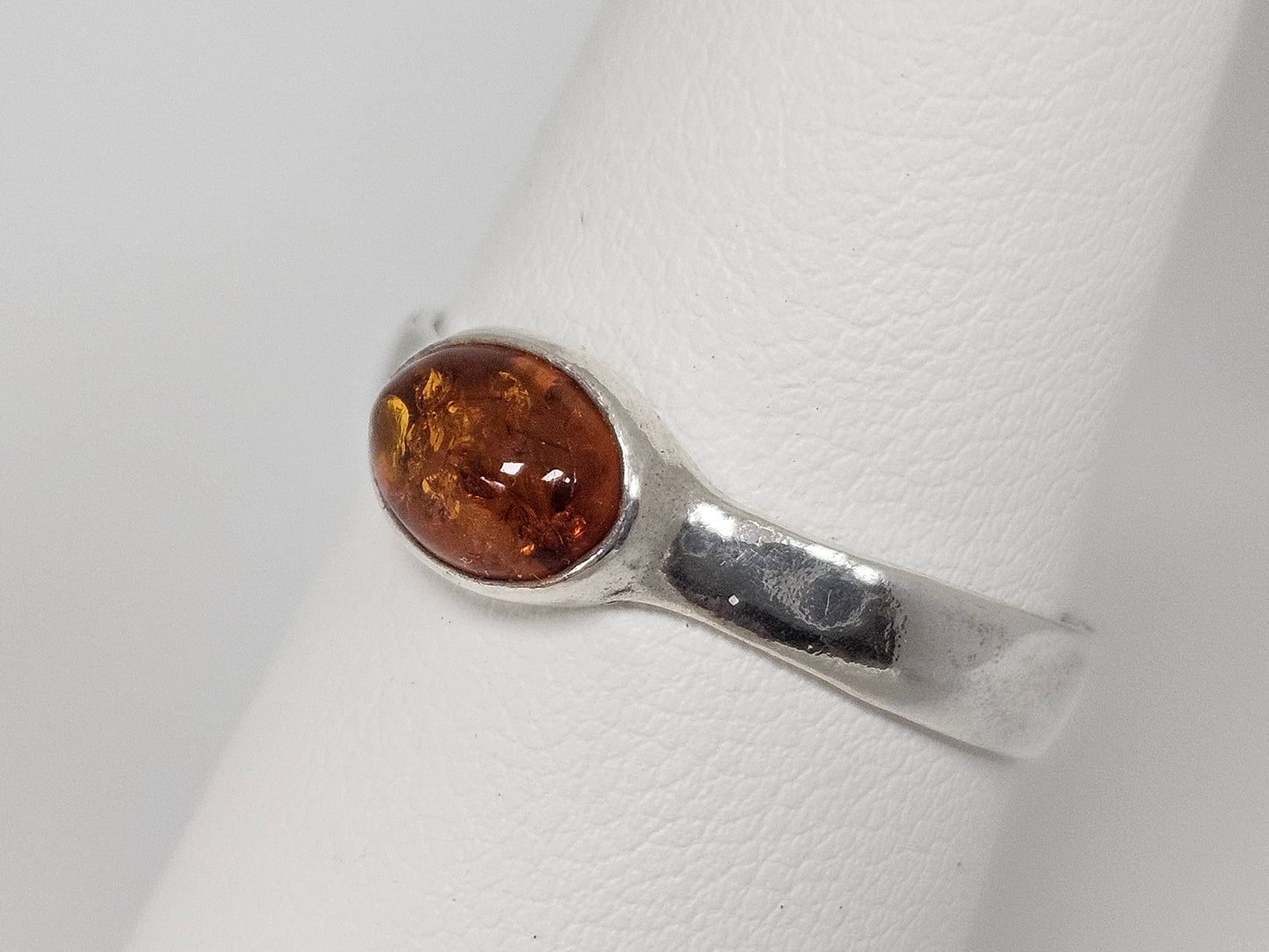 SS RING AMBER OVAL CAB