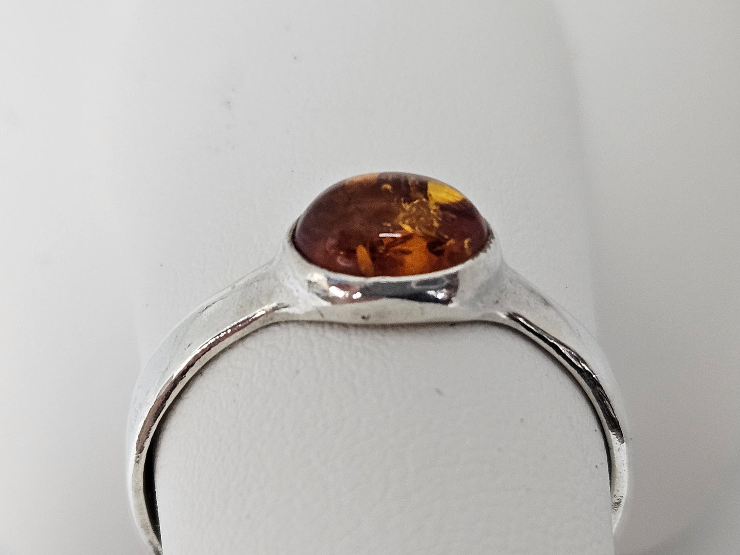 SS RING AMBER OVAL CAB
