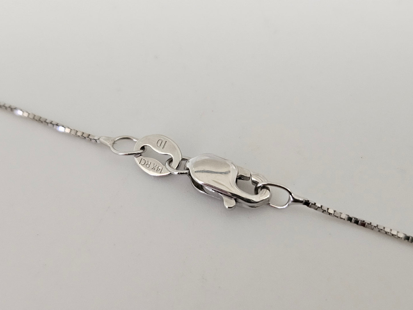 Love Knot Necklace .65cttw 14kwg 18" .6mm Box Ch