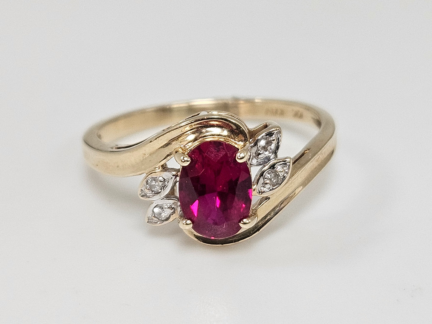 1 CT OVAL Lab RUBY 10KYG, Bypass Ring .02cttw