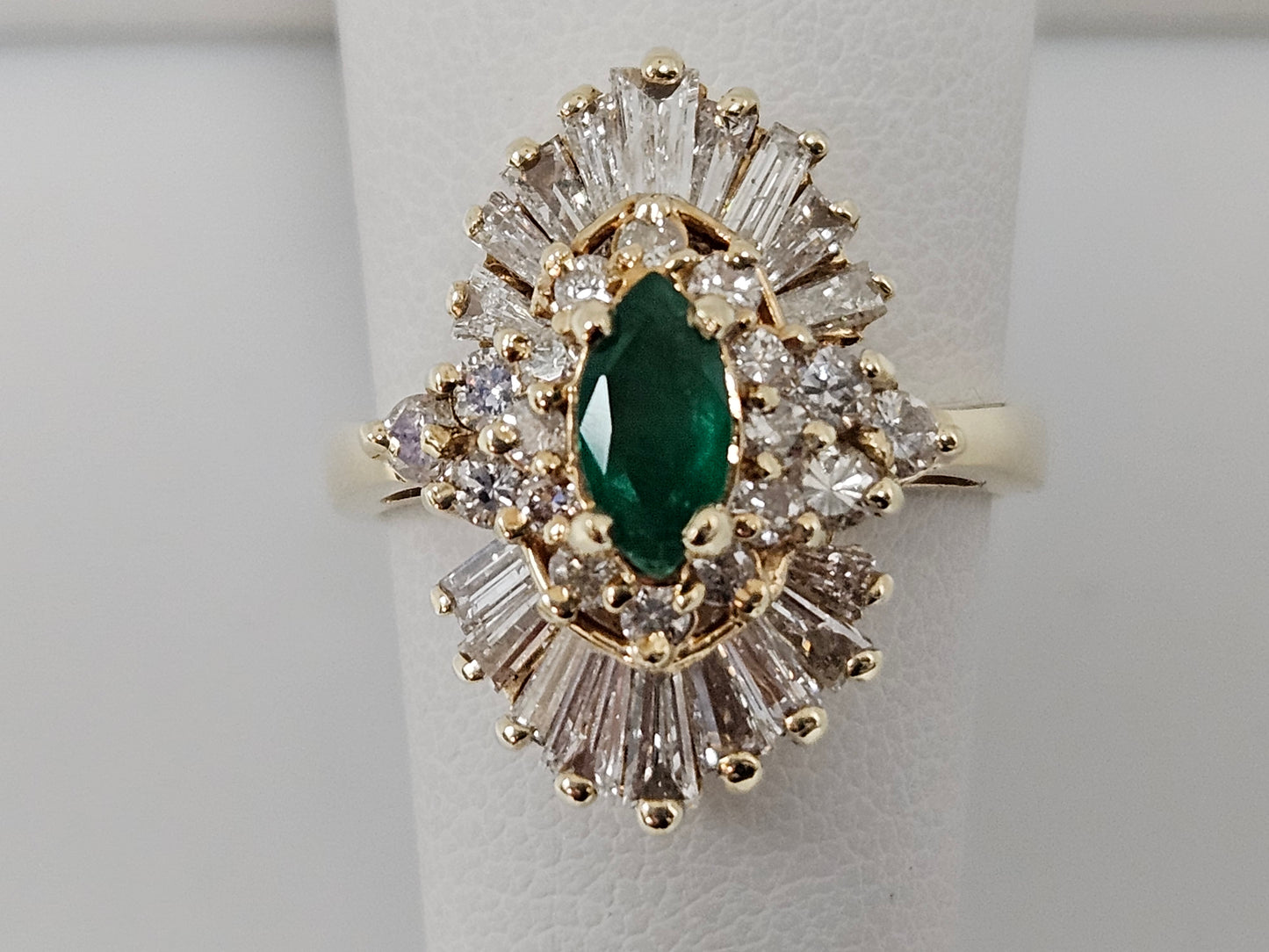 MQ .50CT EMERALD/DIA BAGU 1CT DIA 14KYG RING