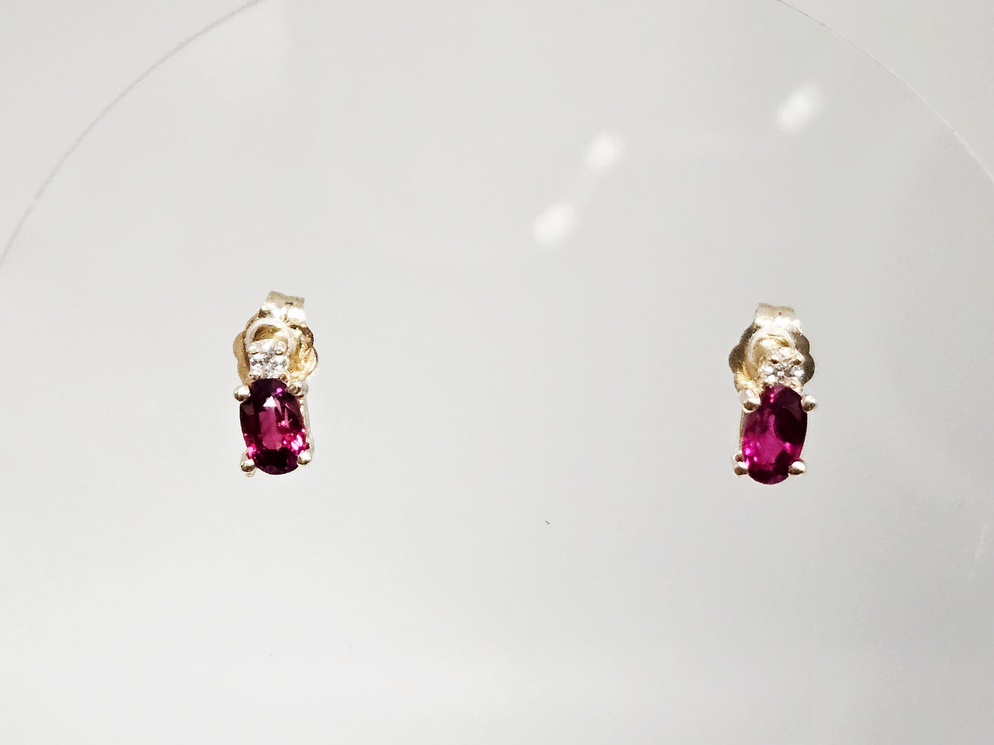 Ruby/Dia studs .66ct Ruby .06cttw Dia 14KYG