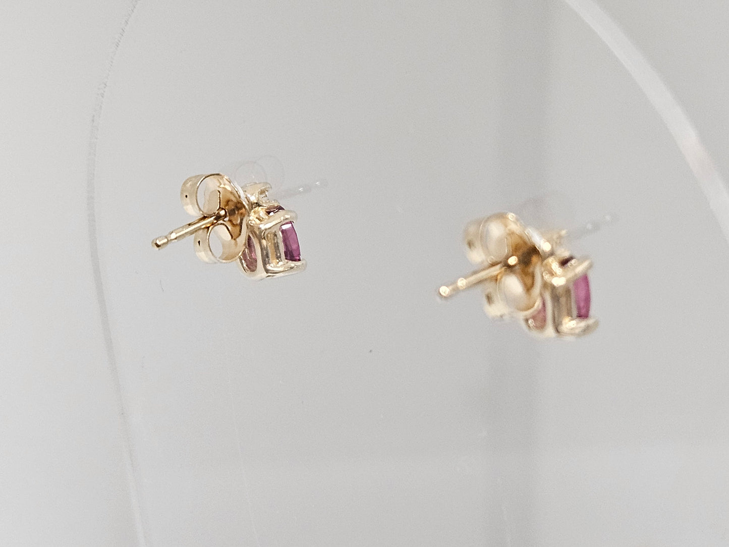 Ruby/Dia studs .66ct Ruby .06cttw Dia 14KYG