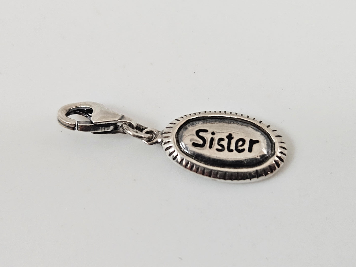 Oval SS 'Sister" Charm
