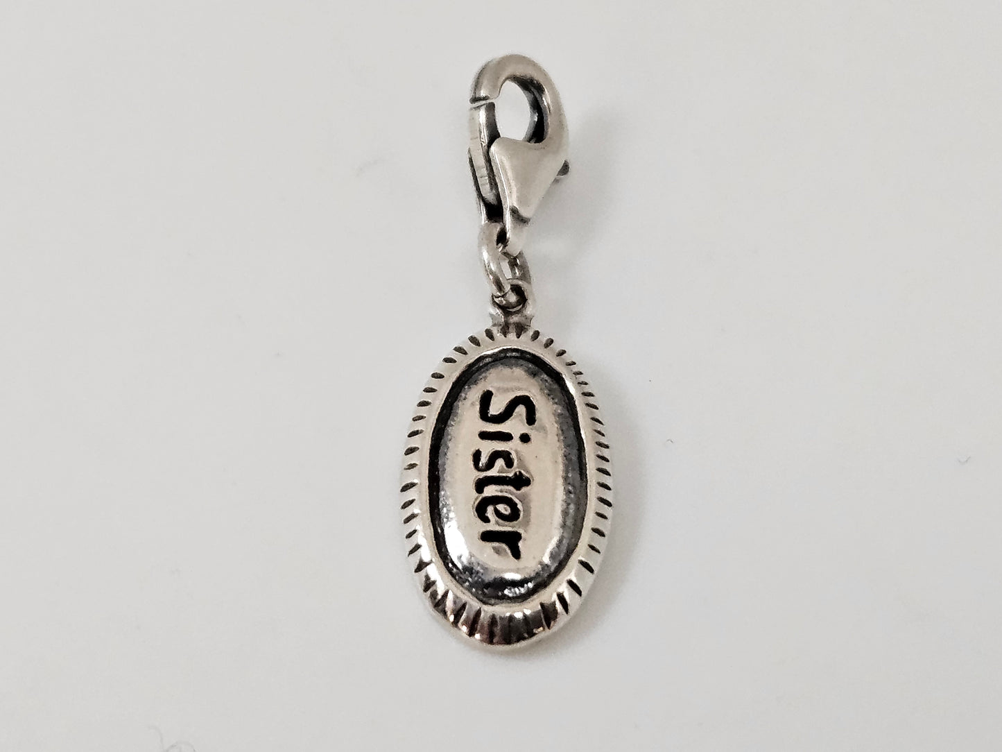 Oval SS 'Sister" Charm