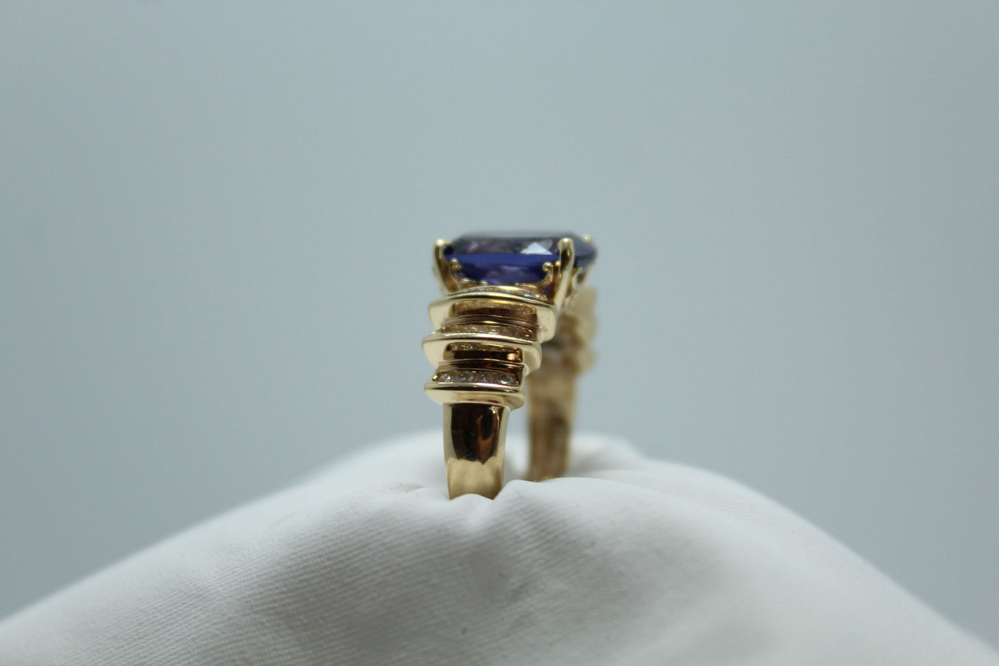 7ct Tanzanite/ Diamond .50cttw DIA 14KRG 6.5g Sz8.5