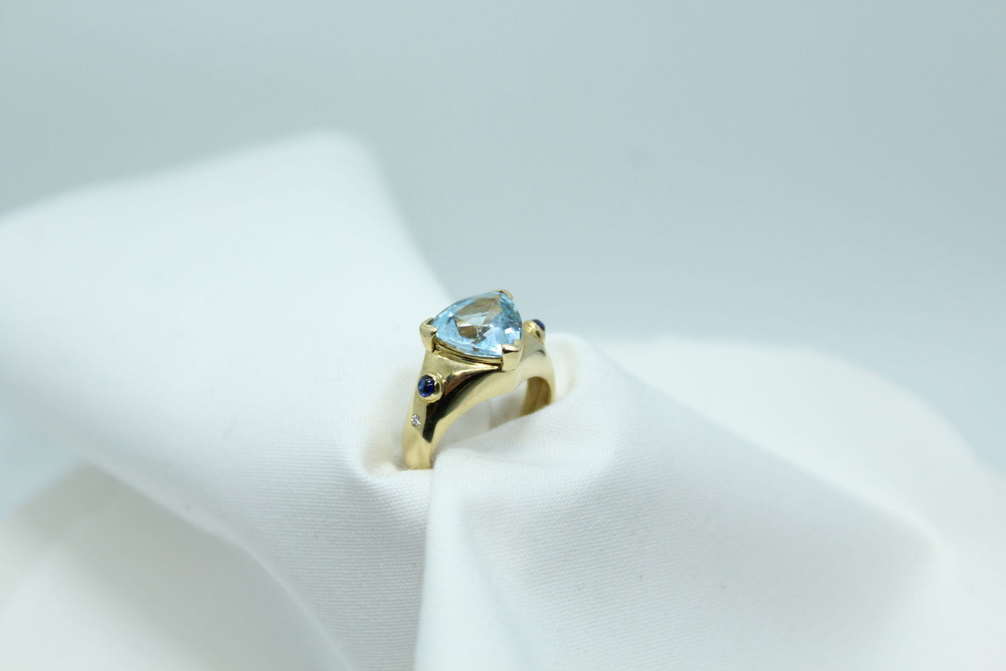 2CT Aquamarine Trillion .10CT TW Sapphire 14KT YG Ladies Ring