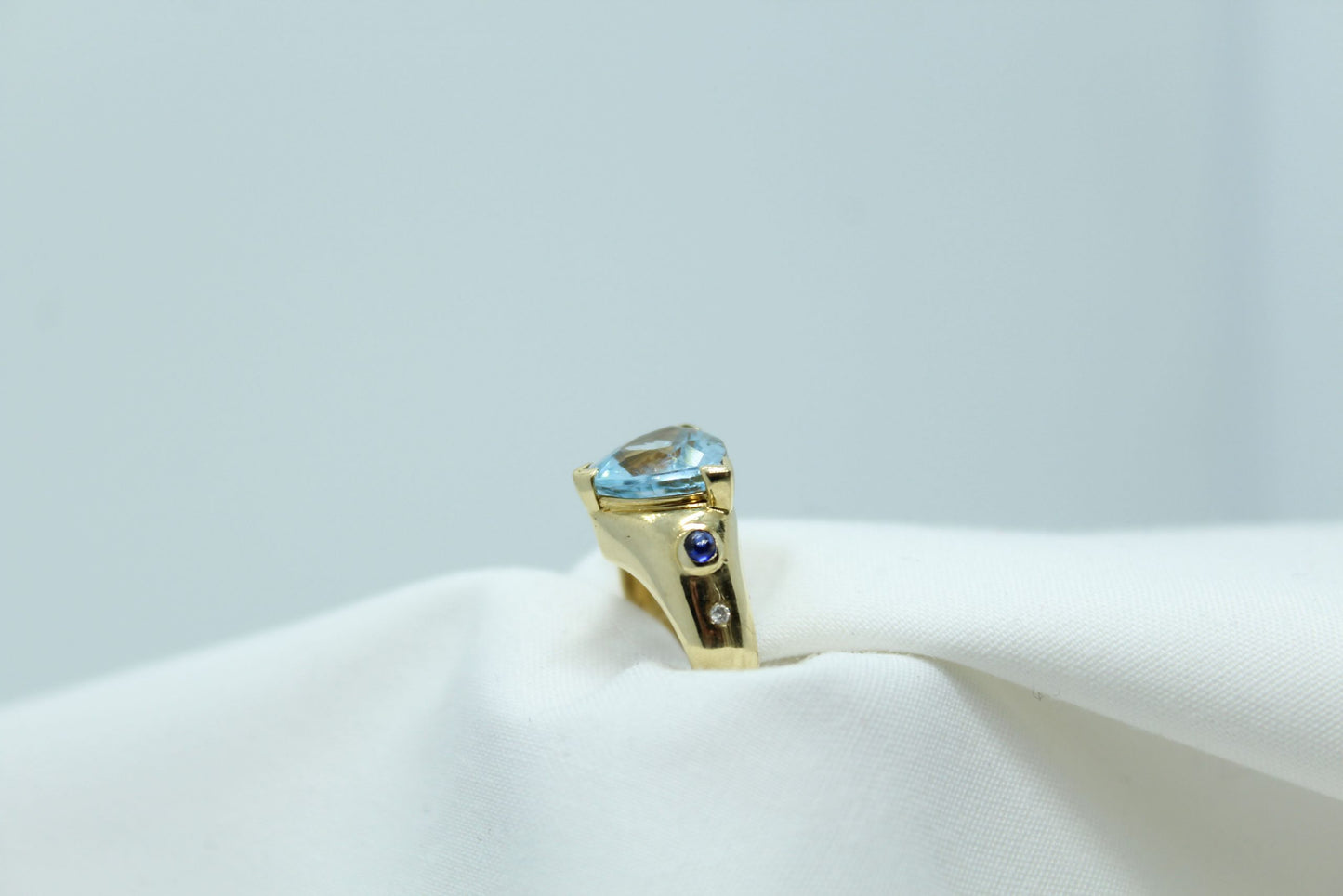 2CT Aquamarine Trillion .10CT TW Sapphire 14KT YG Ladies Ring