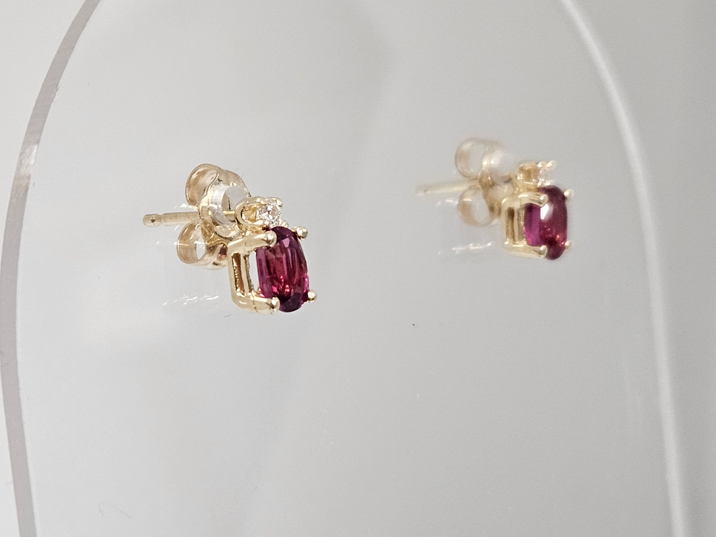 Ruby/Dia  studs .66ct Ruby .06cttw Dia 14KYG