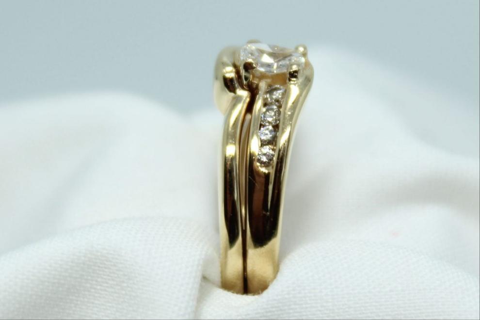 .25CT Oval DIA Center .50CT TW 14K YG Ladies Engagement Ring