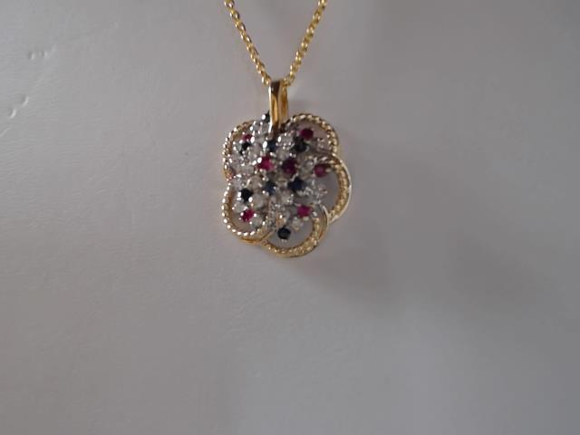 .75CT TW 14KT YG RED, WHITE & BLUE PENDANT NO C
